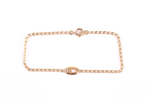 Lot 54 - An 18ct yellow gold bracelet, with a small...