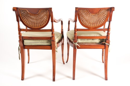 Lot 124 - A pair of Regency style painted mahogany open...