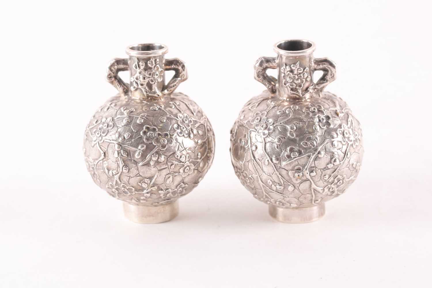 Lot 156 - A pair of early 20th Chinese Wang Hing silver...