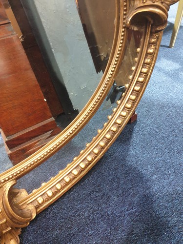 Lot 341 - A Victorian carved wood and gilt gesso oval...