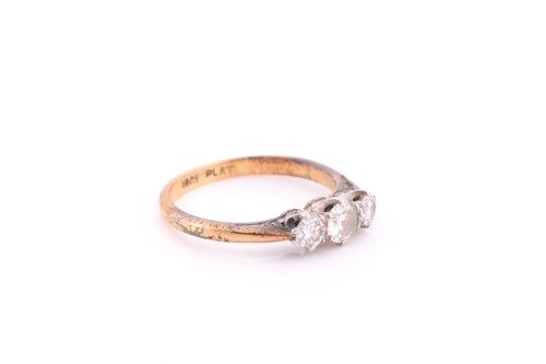 Lot 267 - A three stone half hoop diamond ring, the...
