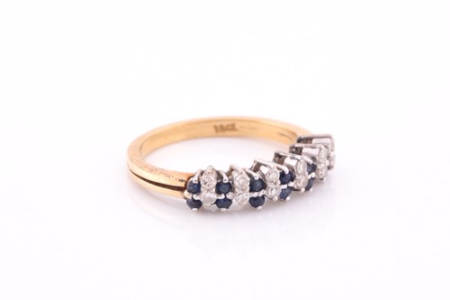 Lot 2 - A sapphire and diamond half hoop ring; the...