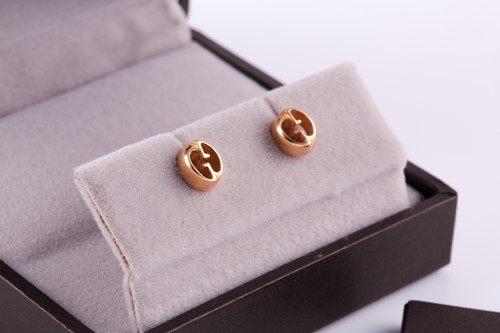 Lot 37 - Gucci. A pair of 18ct yellow gold stud...