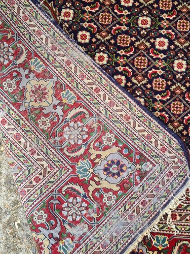 Lot 376 - A fine 20th blue ground Tabriz rug with a...