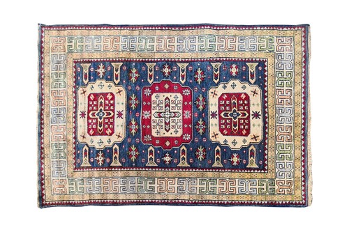 Lot 379 - A 20th century abrash blue ground Turkish rug....