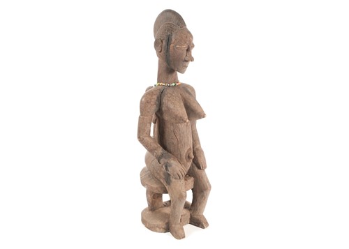 Lot 245 - A Baule seated maternity figure, Ivory Coast,...