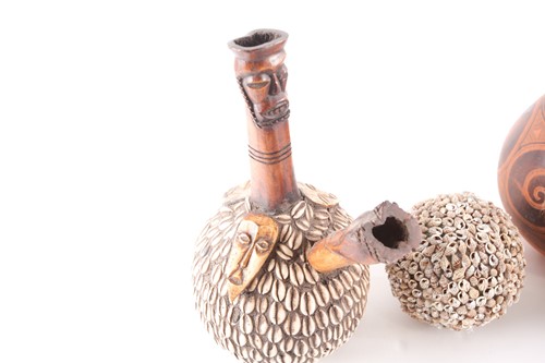 Lot 255 - Two Congo gourd calabash pipes, the taller...