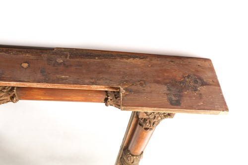 Lot 386 - A Regency inverted breakfront carved wood and...