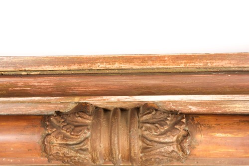 Lot 386 - A Regency inverted breakfront carved wood and...
