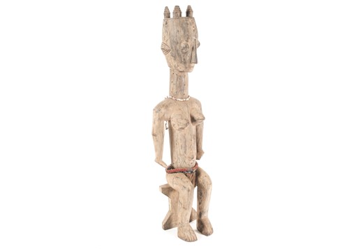 Lot 260 - A large Bantu seated female figure, Nigeria, a...