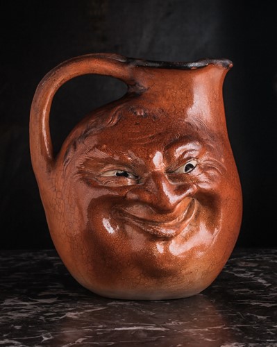 Lot 545 - A Martin Brothers large double-sided stoneware...