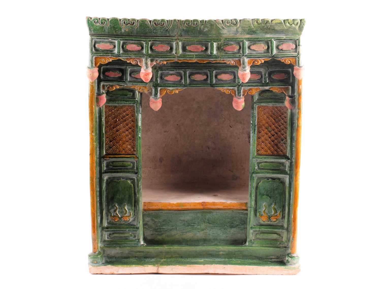 Lot 283 - A Chinese pottery Sancai glazed shrine, late...