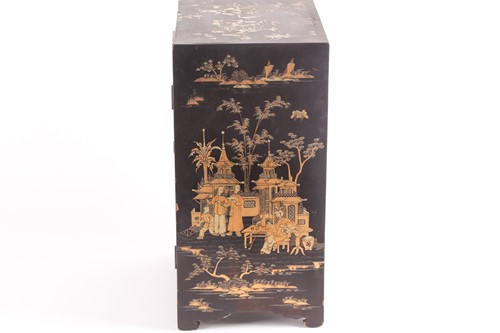 Lot 243 - A 20th century Chinese black lacquer table-top...
