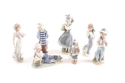 Lot 558 - Seven Lladro figures, five of which are annual...