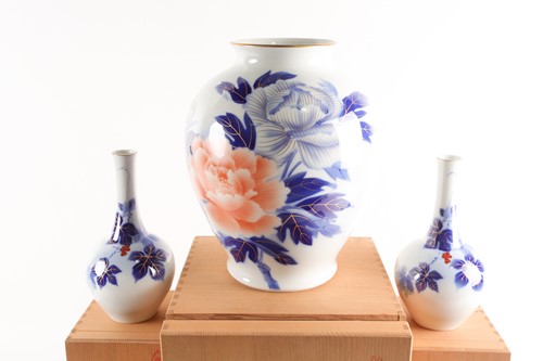 Lot 277 - A garniture of three Fukagawa vases, the...