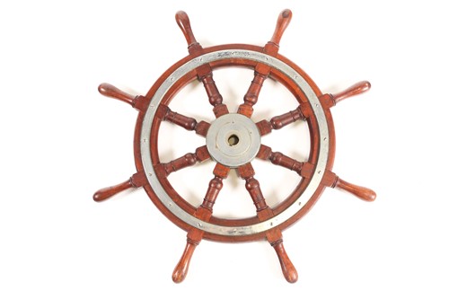Lot 508 - A teak wood ship's wheel with turned spindles...