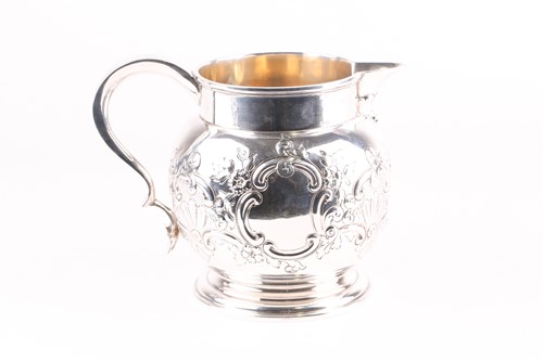 Lot 329 - A late Victorian silver water jug, London 1897...
