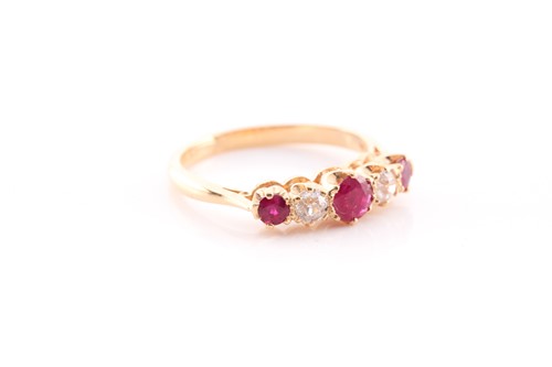 Lot 163 - A ruby and diamond five stone ring set in 18...