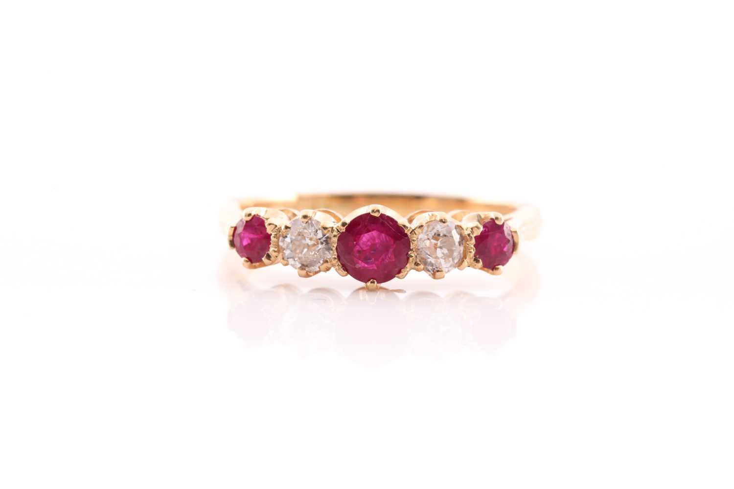 Lot 163 - A ruby and diamond five stone ring set in 18...