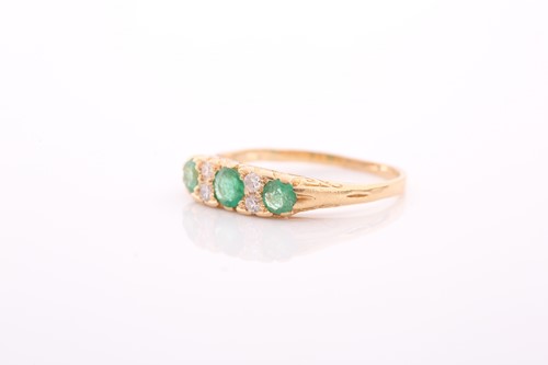 Lot 9 - An early 20th century gold, emerald and...