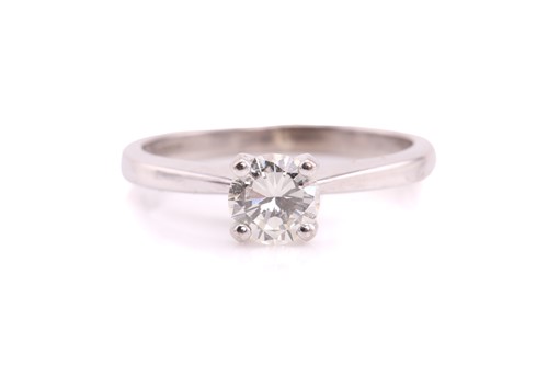 Lot 80 - A single stone diamond ring, the round...