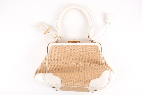 Lot 265 - A Prada weave and white leather handbag, the...