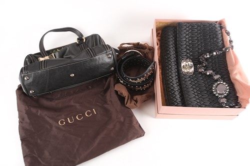 Lot 268 - A Gucci blue and black leather handbag with...