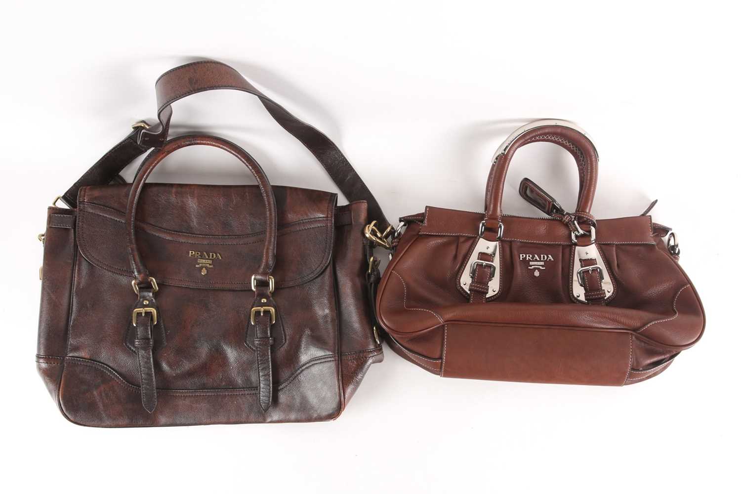 Lot 262 - A Prada brown leather handbag with chrome...