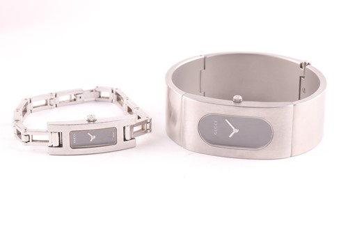 Lot 402 - Two modern Gucci ladies stainless steel...