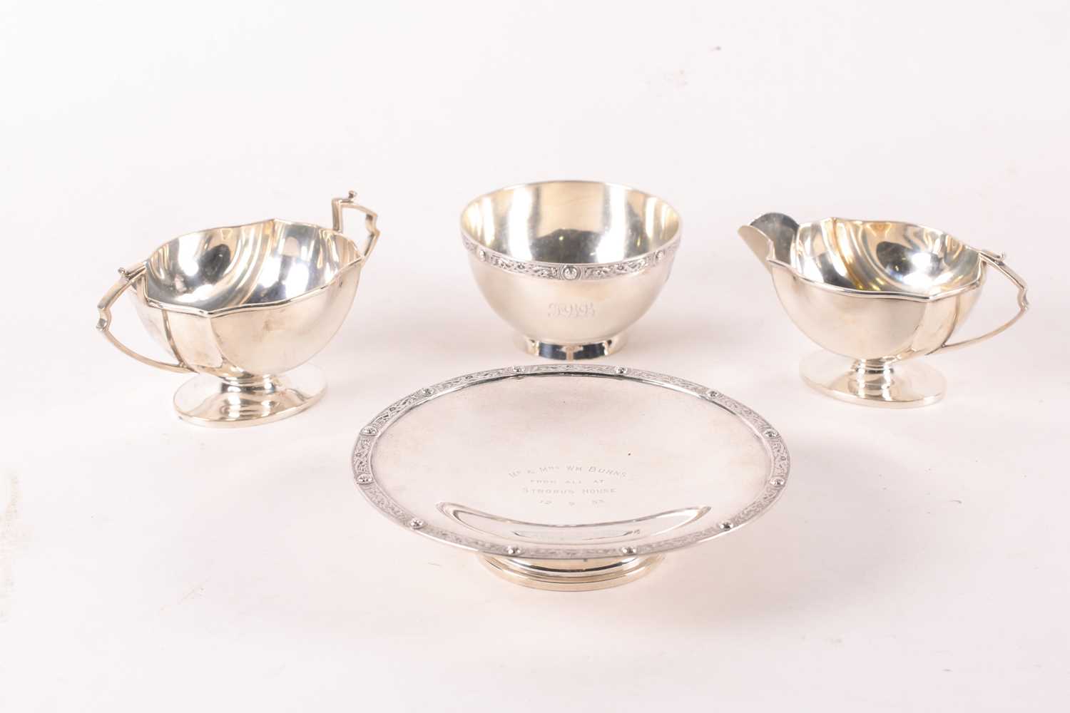 Lot 348 - An Art Deco silver cream jug and two-handled...