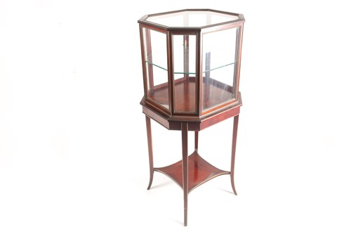 Lot 104 - A mahogany and brass bijouterie cabinet, circa...
