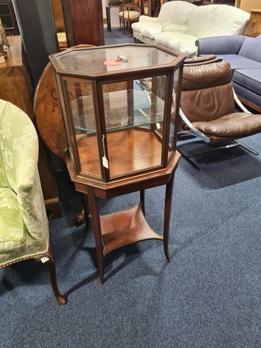 Lot 104 - A mahogany and brass bijouterie cabinet, circa...
