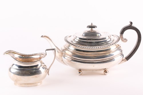 Lot 311 - A George VI silver boat form teapot and a...