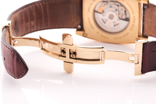 Lot 401 - A Christopher Ward gold plated automatic...