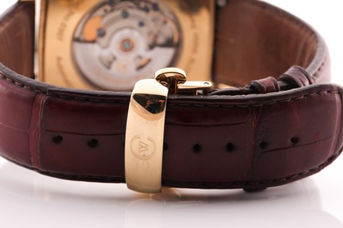 Lot 401 - A Christopher Ward gold plated automatic...