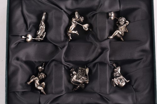 Lot 313 - A set of six modern cast silver cherub name...