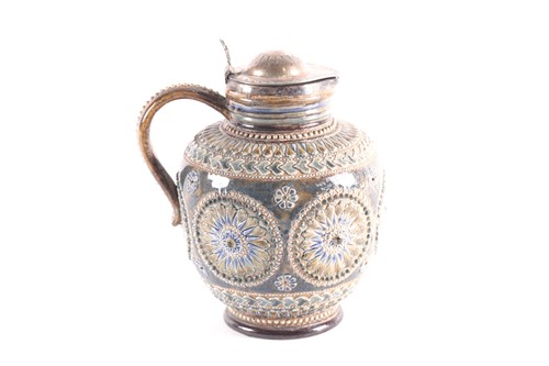 Lot 450 - A Doulton Lambeth stoneware silver mounted jug,...