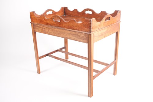 Lot 111 - A George III style mahogany butler's tray-top...