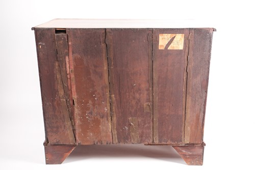 Lot 116 - A George II walnut chest of three long drawers,...