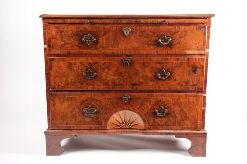 Lot 116 - A George II walnut chest of three long drawers,...