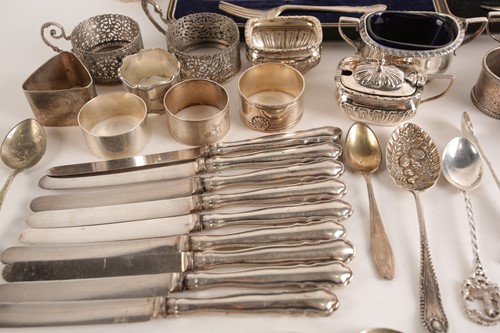 Lot 298 - A mixed collection of silver napkin rings,...