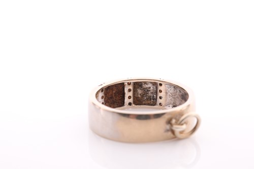 Lot 208 - An 18 carat white gold and diamond ring; the...