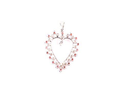 Lot 94 - A diamond and garnet open heart-shaped pendant;...