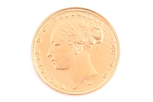 Lot 251 - A Victorian 1883 (M) young head gold sovereign.