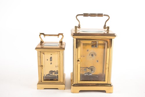 Lot 160 - Two brass carriage clock timepieces, each with...