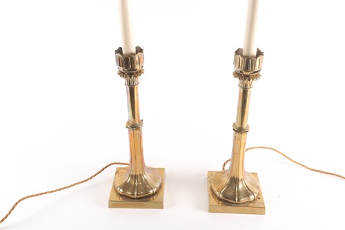 Lot 236 - A pair of Victorian brass candlesticks, with...