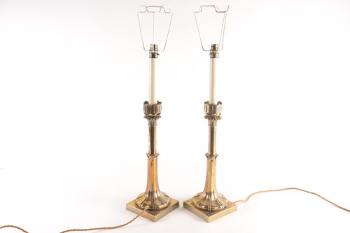 Lot 236 - A pair of Victorian brass candlesticks, with...