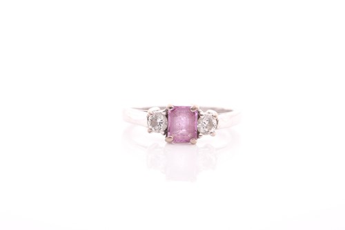 Lot 120 - An 18ct white gold, pink sapphire, and diamond...
