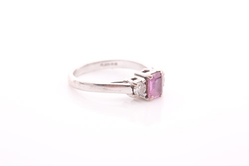Lot 120 - An 18ct white gold, pink sapphire, and diamond...