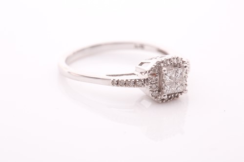 Lot 59 - A 14ct white gold and diamond cluster ring,...